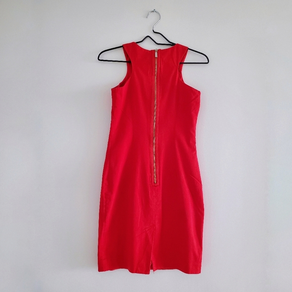 Sleeveless Fitted Dress. It’s a little tight on me but super cute. - Picture 2 of 7